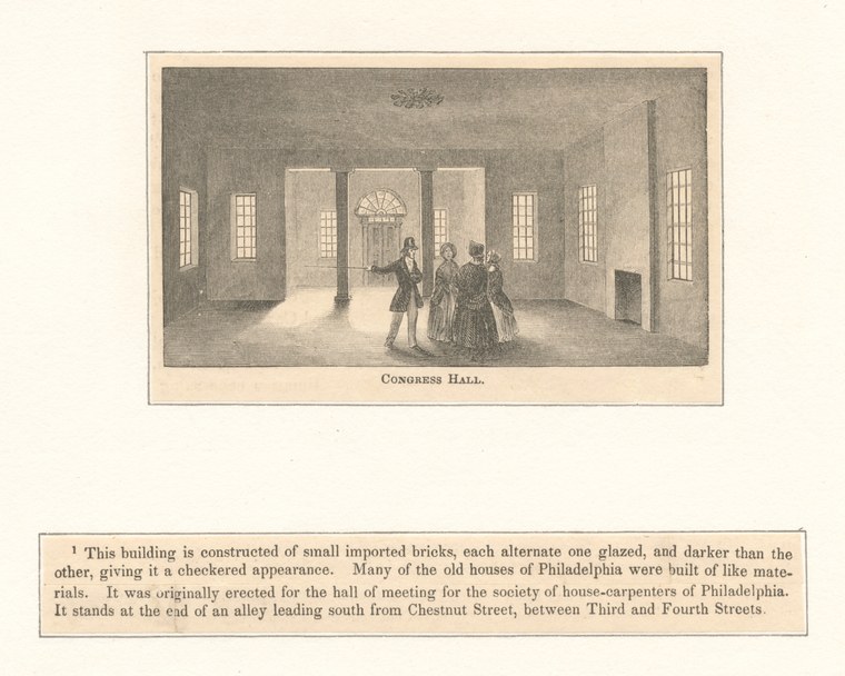 Interior of a neoclassical hall with tall windows, columns, and a coffered ceiling. Three formally dressed figures stand in the center.