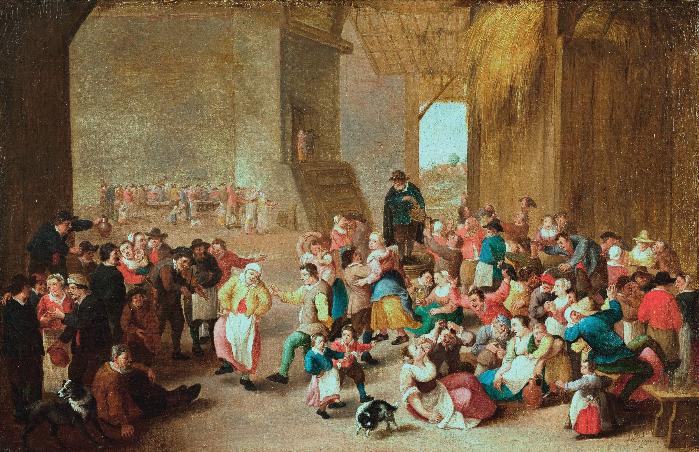 Peasants dance and celebrate in a crowded stone barn; a couple dances at center while children, spectators, and dogs fill the earthen floor.