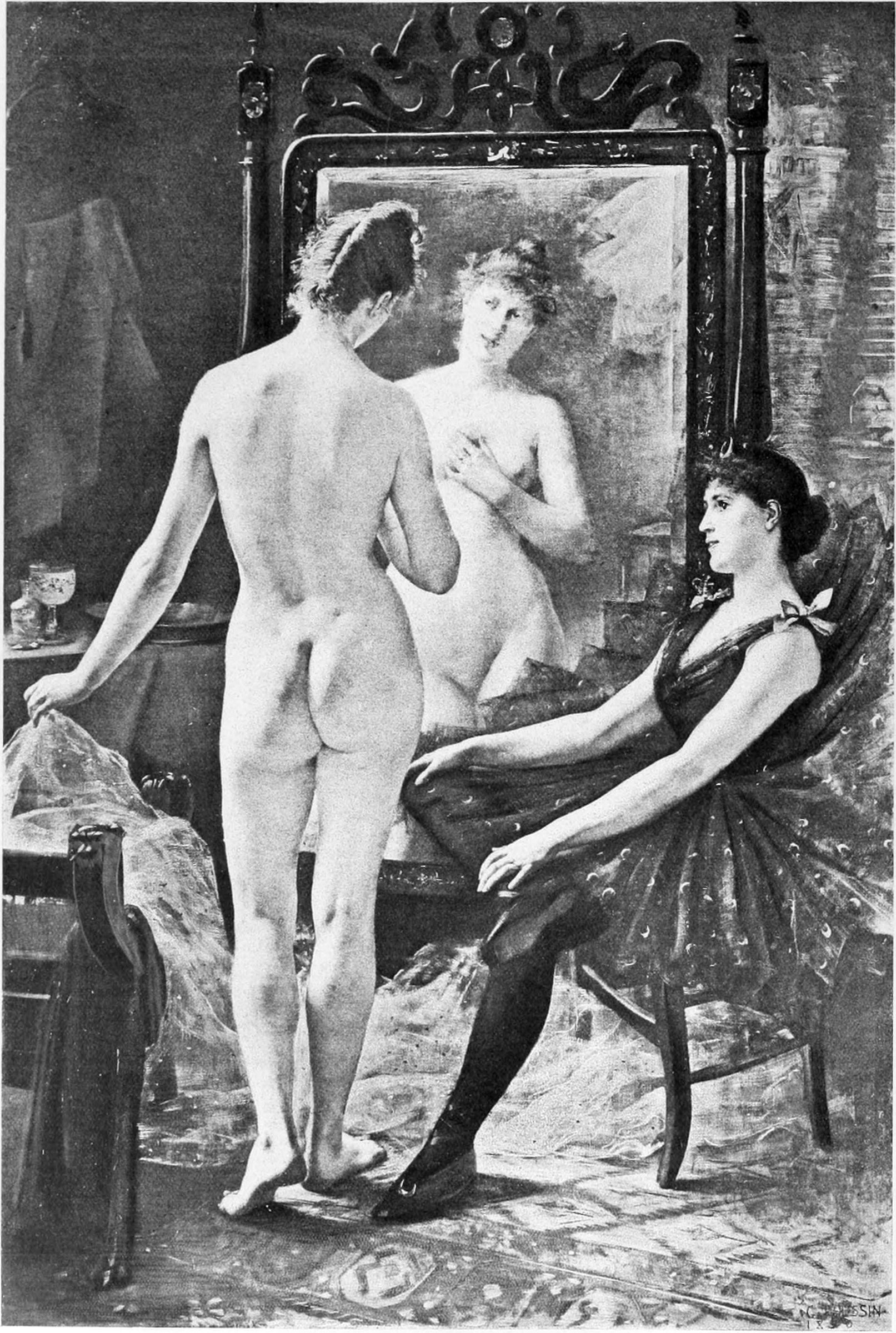 Two nude women stand before an ornate mirror, watched by a clothed woman seated nearby in a studio interior.