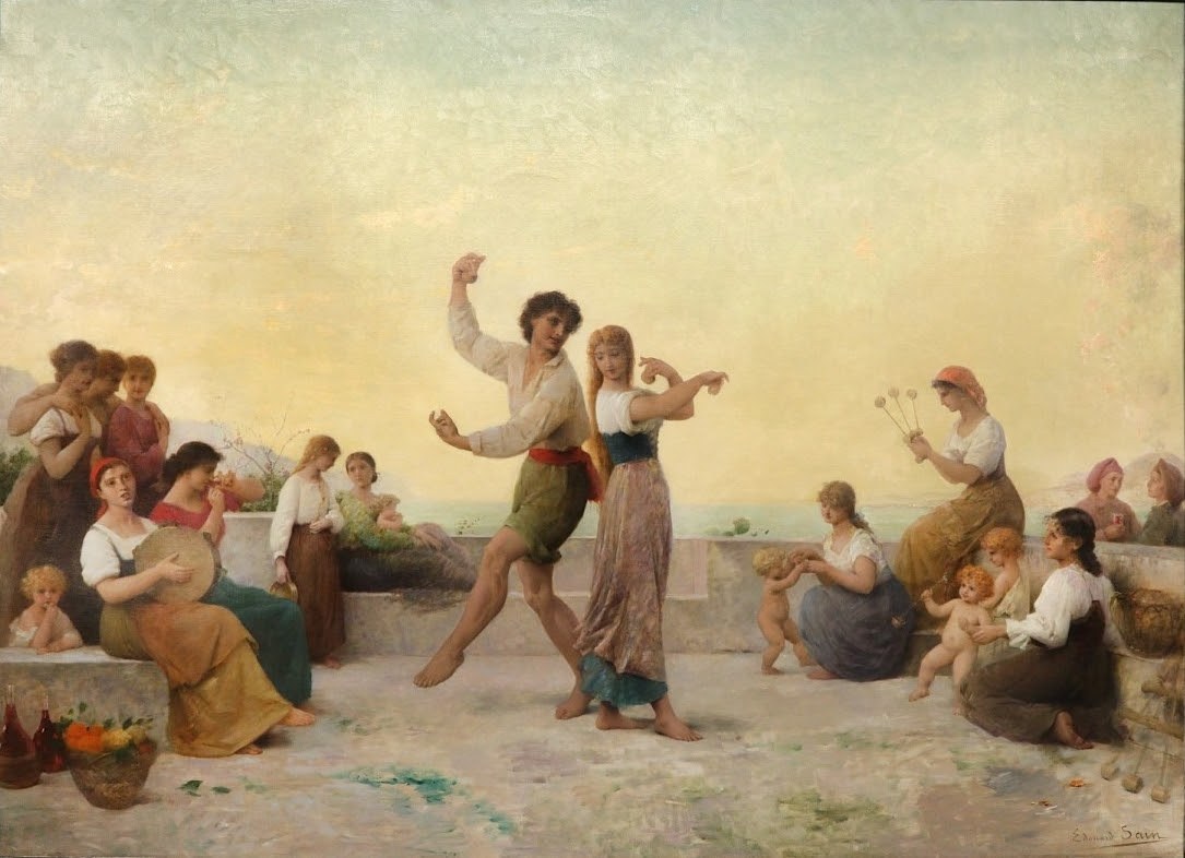 Man and woman dance vigorously on a sunlit Mediterranean terrace, surrounded by seated women, children, and onlookers, with the sea visible in the distance.