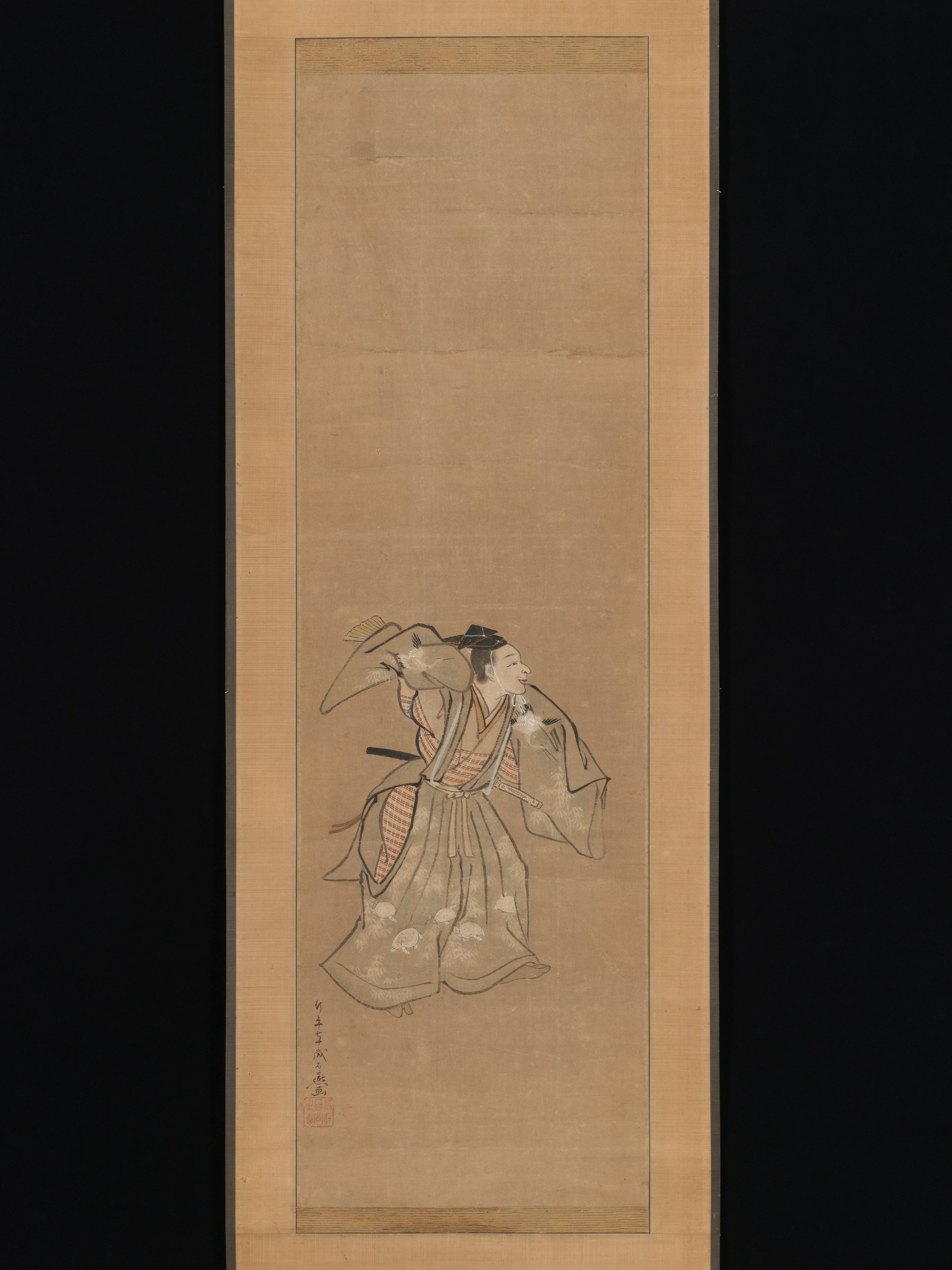 A figure in formal layered robes and dark hat stands in profile, one arm extended, against a plain background on a scroll.