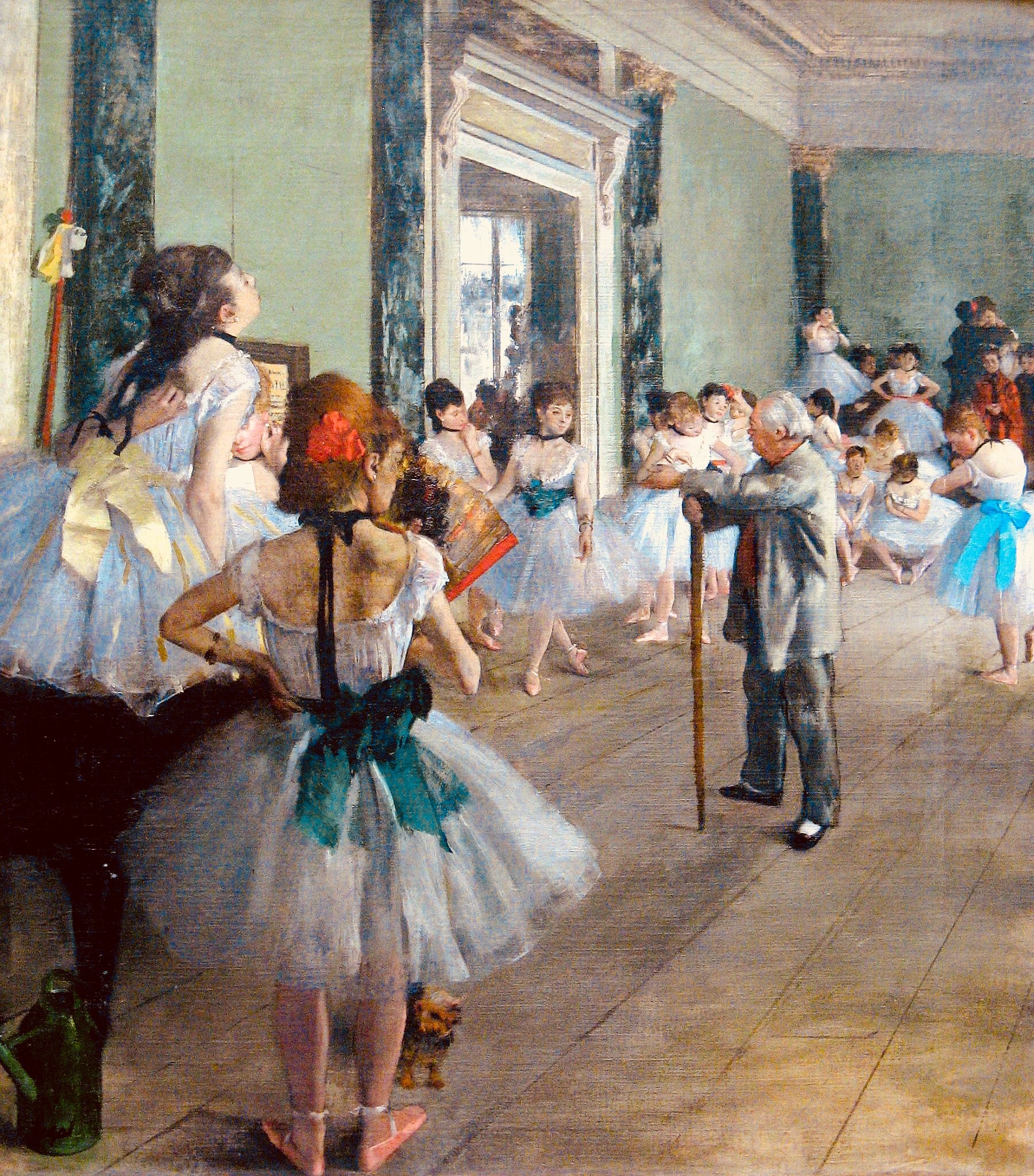 An elderly ballet master with a cane observes young female dancers in tutus during class in a sunlit studio; a pianist plays in the foreground.