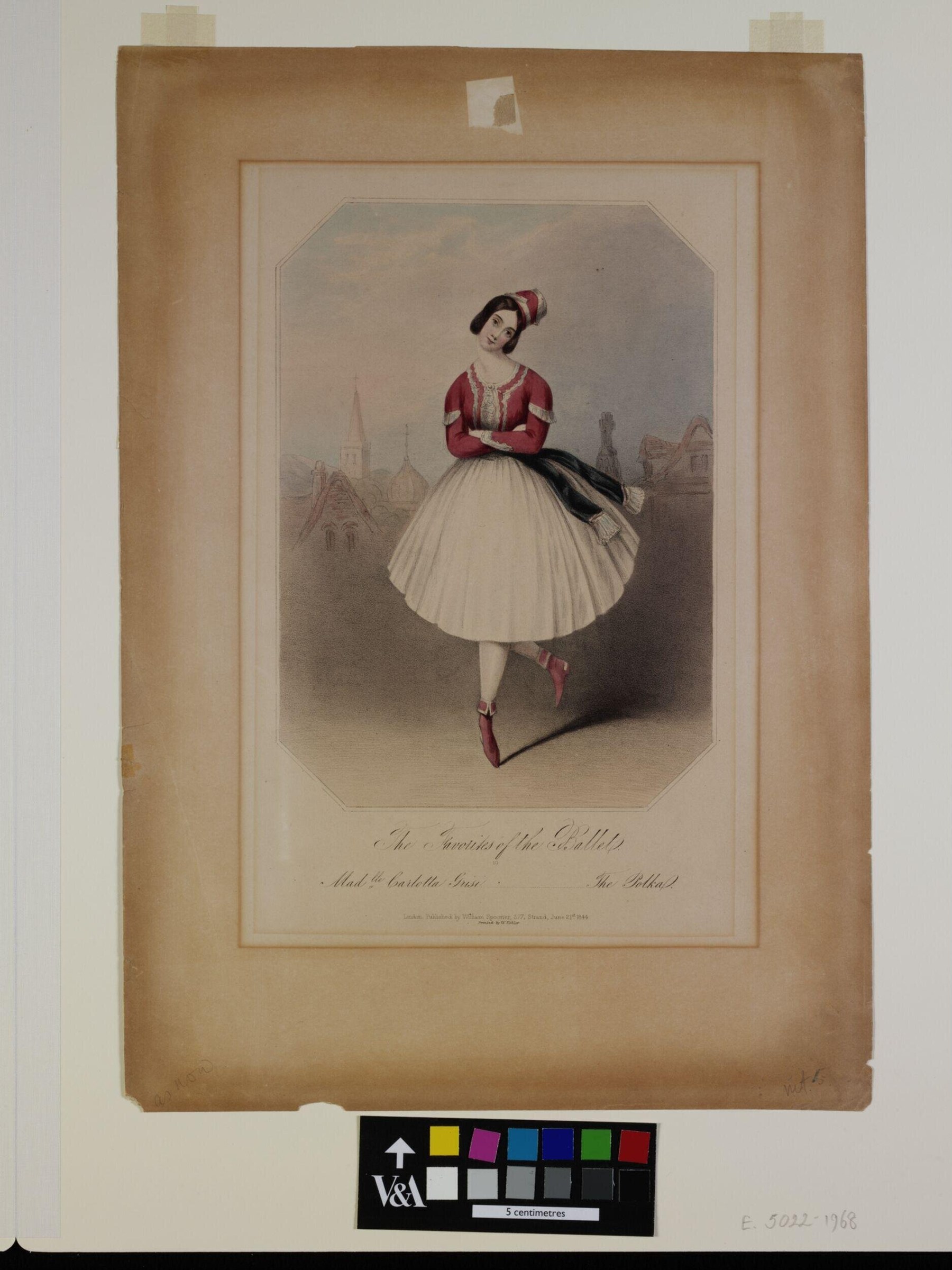 A woman in burgundy bodice and full white tutu stands poised against a city backdrop, wearing a small headdress and burgundy heels.