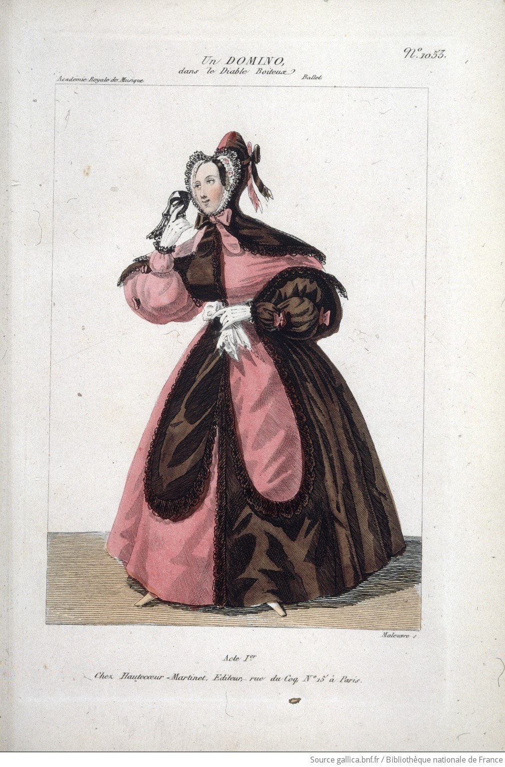 Hand-colored engraving of a woman in an elaborate pink and black masquerade costume with a plumed headdress, holding a small dog.
