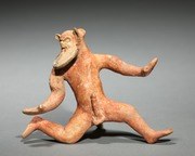 Terracotta figurine of a bearded male satyr in a twisted, kneeling squat with one arm raised overhead and head thrown back.