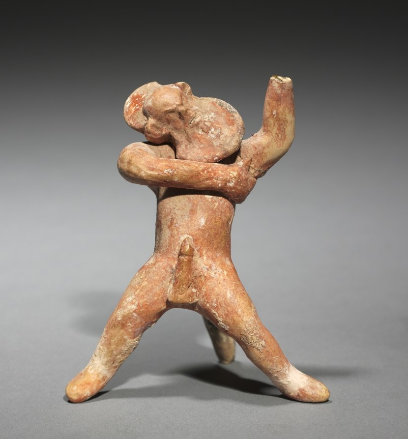 Terracotta figurine of a bearded satyr in a wide-legged lunging pose with torso twisted and one arm raised, head tilted back.