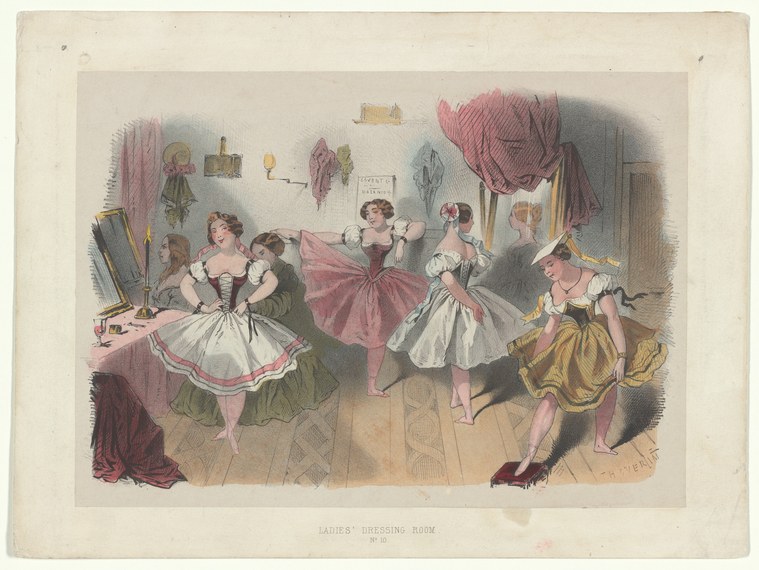 Six women in a crowded dressing room, some in ballet costume with tutus and pointe shoes, others undressing or adjusting their appearance.