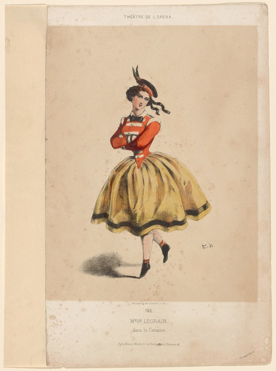 A young female dancer in a red-and-white striped jacket and pale yellow full skirt with feathered headdress, posed in profile against a plain background.