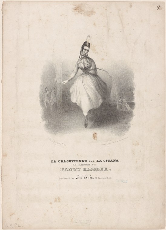 A woman in classical ballet dress with raised arm stands alone on a darkened stage, hand near her face in an expressive gesture.