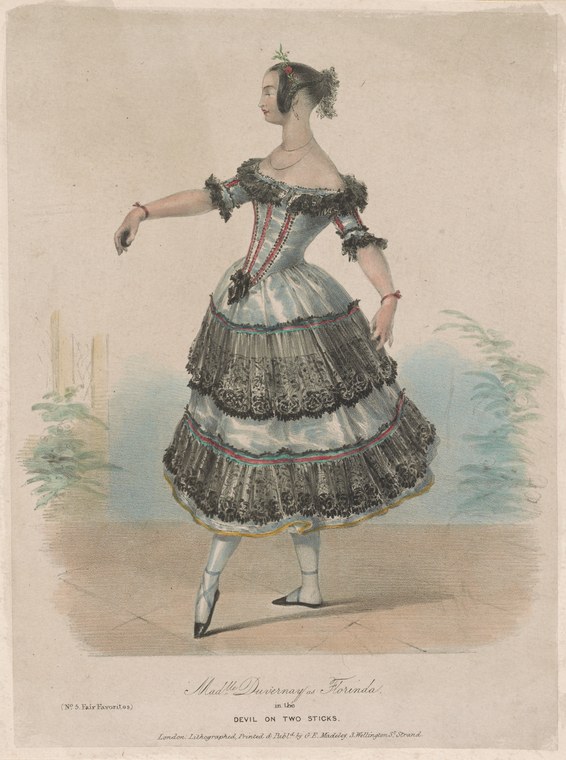 Hand-coloured lithograph of a woman in 1830s theatrical costume with a grey-blue bodice and black lace-tiered skirt, standing in a posed three-quarter turn.