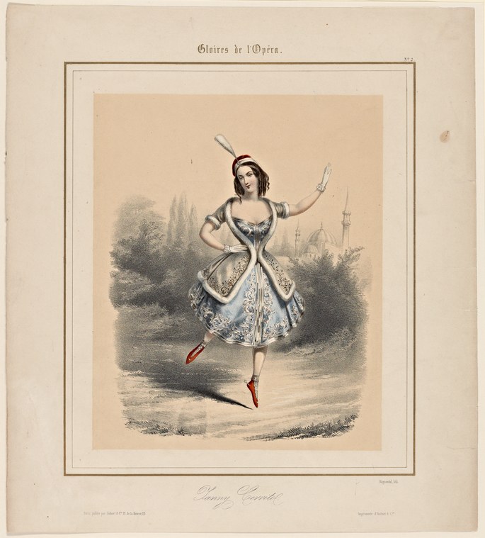 A woman in an ornate white dress with a feathered headdress performs a ballet pose with one leg raised and arms extended, against a landscape background.