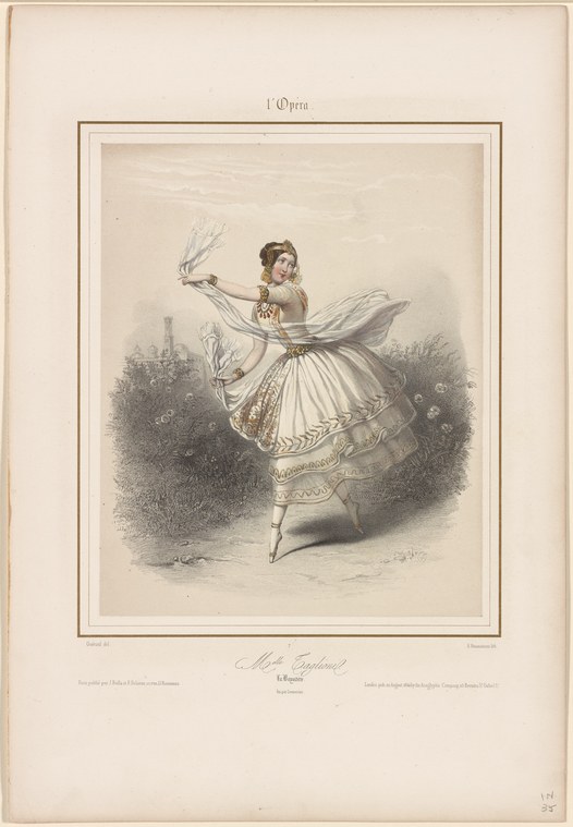 A woman in a pale tulle dress stands on pointe in an arabesque pose, one arm curved overhead, gazing upward against a shadowed stage background.