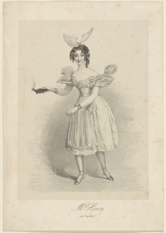 Woman in theatrical costume with puffed sleeves, gauze skirt, and winged headdress stands in a formal pose.