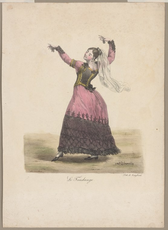 A woman in a dark corset and pink skirt with lace trim raises both arms high, head tilted back, in a pose of spirited joy.