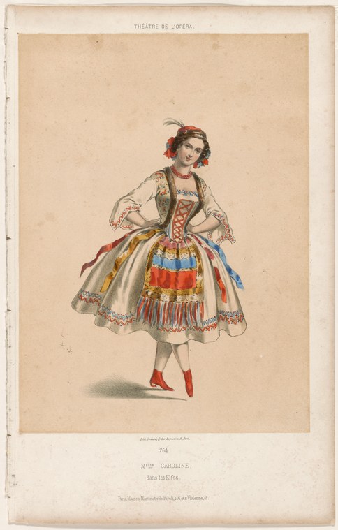A woman in 19th-century theater costume stands in three-quarter pose, wearing an elaborately embroidered bodice, layered skirt with colored bands, and red
