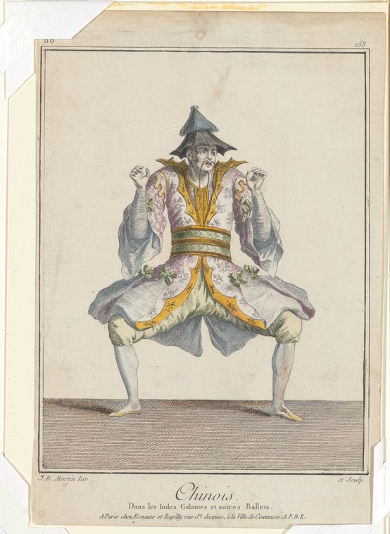 Male figure in pointed hat and ornate gold-trimmed jacket in extreme squat pose with splayed arms and emphatic hand gesture.