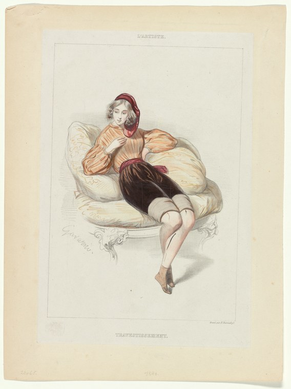 A female dancer in a rust-colored tunic and crimson head covering reclines on a cream-colored settee with one leg extended and foot pointed.