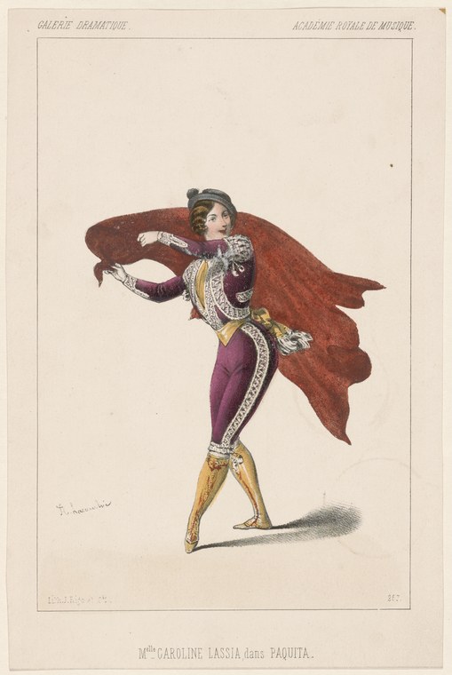 A woman in purple and gold costume with a voluminous rust-red cape strikes a formal theatrical pose, her left arm extended outward.