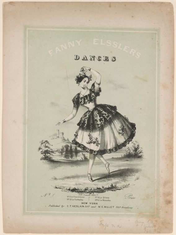 A woman in a short tulle skirt and theatrical headdress stands in a posed ballet attitude, arms aloft, against a landscape background.