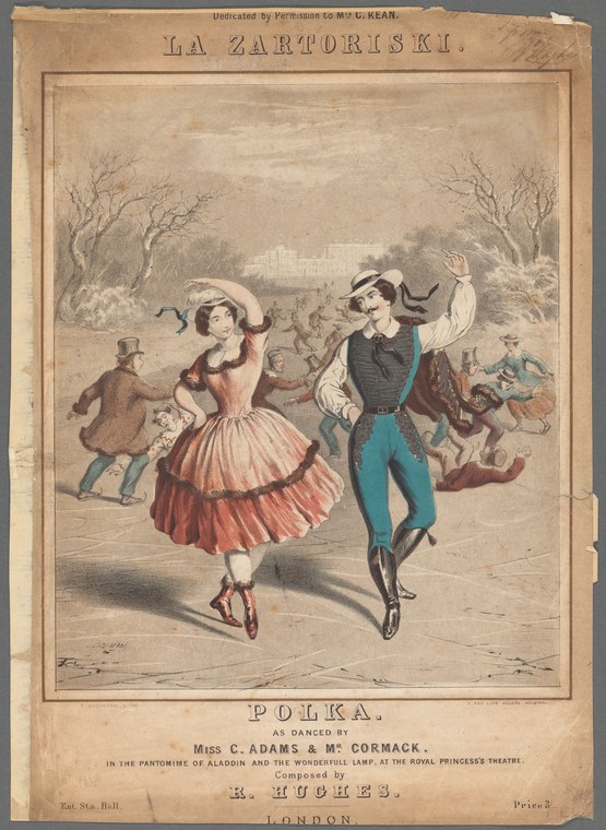 A man in turquoise trousers and a woman in a red skirt mid-polka in a garden setting, with supporting dancers in the background.