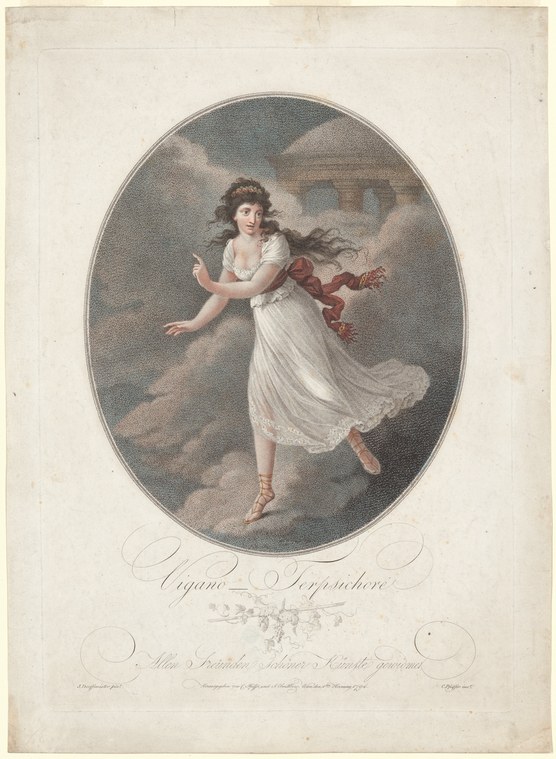 A young woman in white muslin gown performs a solo dance, poised on one leg with the other raised, arms held expressively open, against a dark theatrical