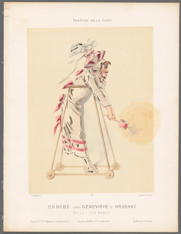A classical ballet dancer in a pale tunic with pink ribbons stands on an elevated platform in a three-quarter pose against a golden-cream background.