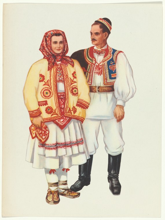 Woman in yellow embroidered jacket and white skirt; man in white shirt, embroidered vest, and headband. Both in formal Balkan folk costume.