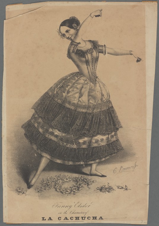 Woman in 1830s theatrical dress with tiered skirt, arm raised overhead, leg extended, captured mid-dance movement.