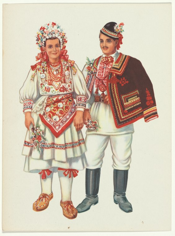 Man and woman in embroidered Yugoslavian traditional costume with floral headdresses, standing in formal pose