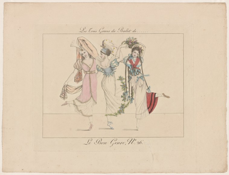 Three female ballet dancers in neoclassical dress pose gracefully in a shallow stage space, arms raised in elegant balletic positions.