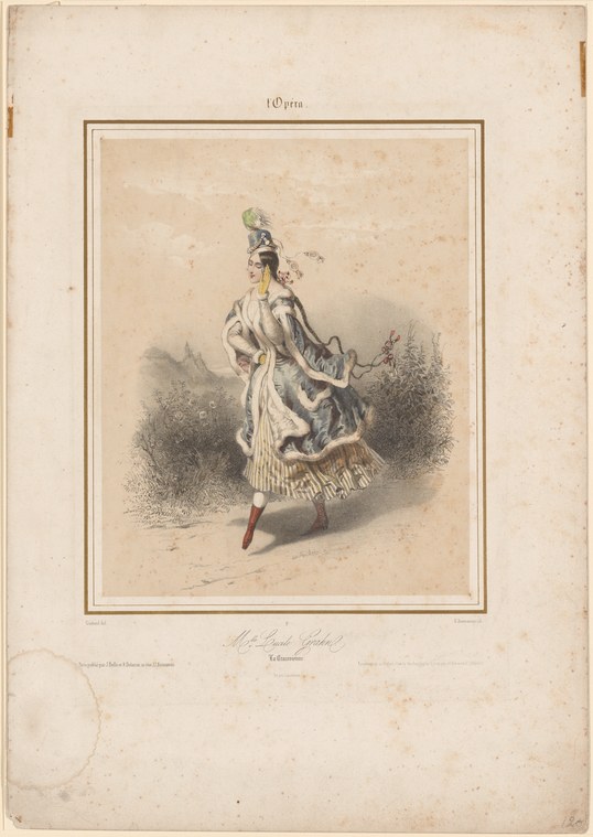 Lucile Grahn in theatrical costume with feathered headdress, white tunic, and patterned skirt, standing posed in a 19th-century dance portrait.