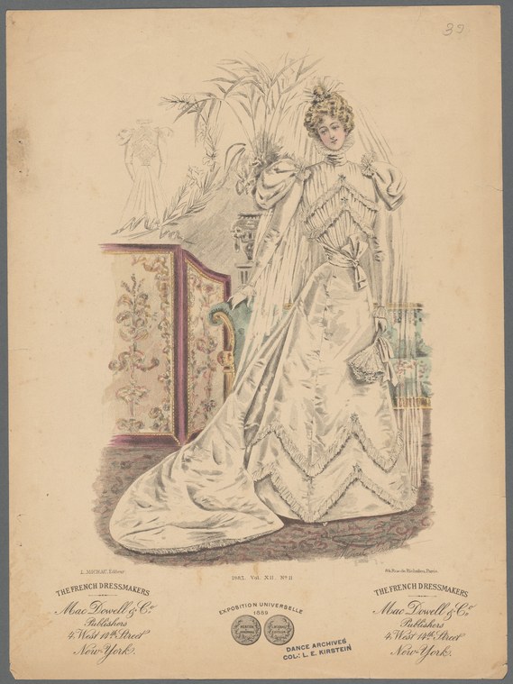 A woman in a white ball gown with puffed sleeves and feathered accessories stands in an elegant pose beside a floral-patterned curtain.