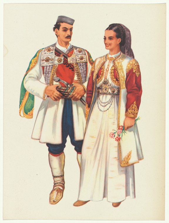 Two figures in embroidered Balkan folk costume stand formally against a plain background: a man in a patterned jacket and knickers, a woman in a red bodice and
