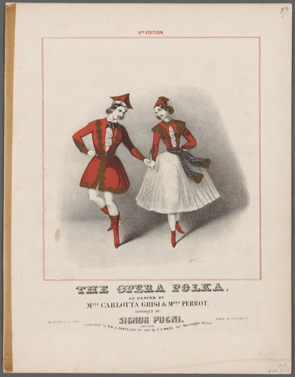 Two female dancers in red jackets and white skirts, posed mid-leap in energetic positions characteristic of the polka.