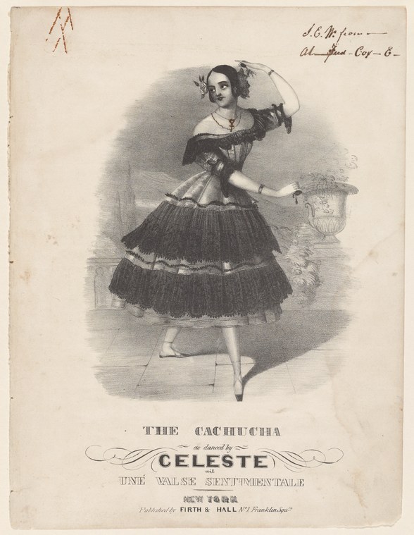 A woman in a black tulle skirt and black bodice stands in a balletic pose with raised and extended arms, captured mid-turn.