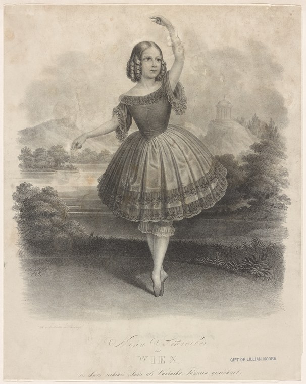 Young girl in Romantic ballet pose wearing corseted bodice and full skirt, right arm raised, standing on the balls of her feet in a landscape with classical