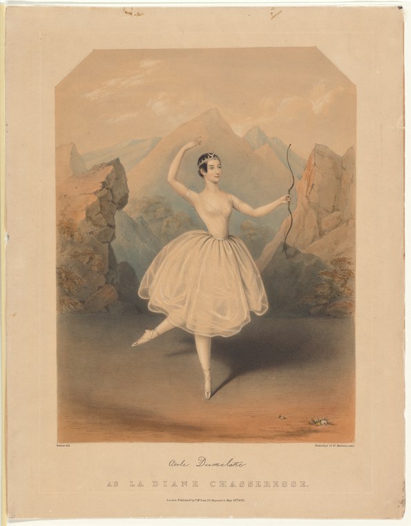 Female ballet dancer in pale tulle skirt and poised relevé stance holds a bow, set against a mountainous landscape.