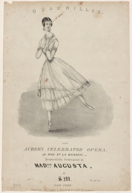 Woman in white Romantic-era dress performing a balletic pose on one leg, hand raised, against a plain background.