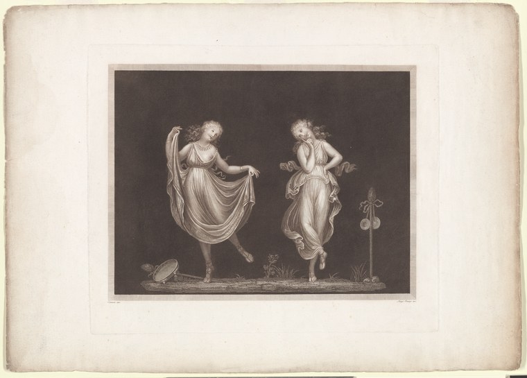 Two barefoot female dancers in classical white drapery strike contrasting poses against a dark background; one reaches upward with open gesture, the other's