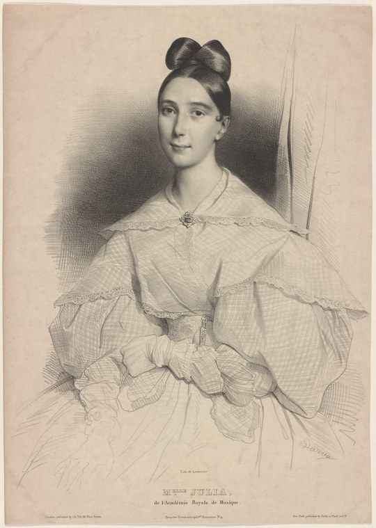 Portrait of a young woman in an elegant white off-shoulder gown with gathered sleeves, standing in relaxed pose.