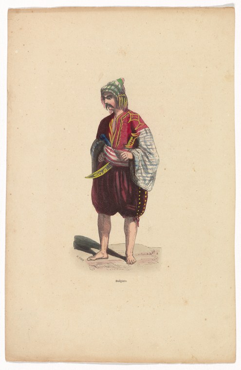 A barefoot figure in red tunic and white checked wrap stands facing forward, wearing a tall green and gold headdress, in a hand-colored engraving.