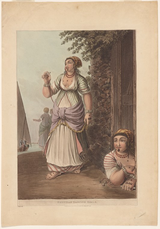 A standing woman in white Neoclassical dress with her right arm raised, gazing upward, inside a columned interior; a seated woman watches from the right.