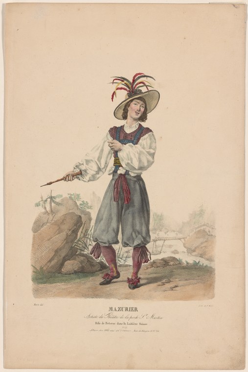 A woman in Swiss peasant dress holds a walking stick, wearing a feathered hat and red stockings, posed in a theater studio.