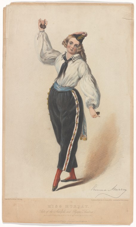 A woman in 19th-century theatrical costume: white shirt, dark breeches with striped trim, jeweled ornament in her hair, left arm raised in an expressive