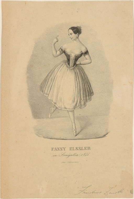 Ballerina in black bodice and pale tulle skirt stands on pointe, arm raised, gazing upward.