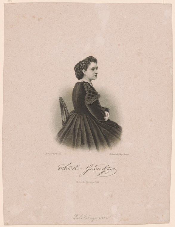 Seated portrait of a young woman in a Victorian-era ballet costume with fitted bodice and pleated skirt, in profile, gazing left.
