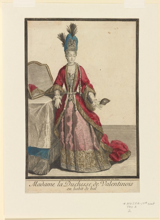 Eighteenth-century hand-colored engraving of a woman in crimson and gold ball dress with high headdress and train, holding a fan, standing before a chair.