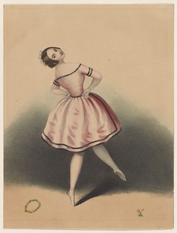 A young female dancer in a pink dress arches backward, one leg extended, head tilted back, posed alone against a soft shadowed background.