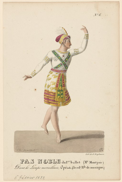 A barefoot dancer in a white bodice, striped skirt, and burgundy turban stands on a platform with both arms raised in a formal pose.