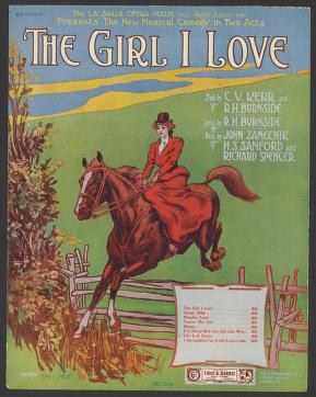 Woman in scarlet riding habit sidesaddle on chestnut horse at jump over fence, golden landscape background, chromolithograph 1911.
